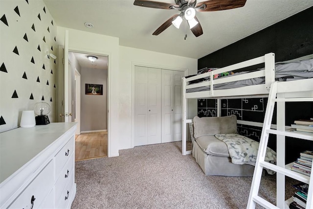 4155 NW Terrace Hills Rd, Piedmont, OK 73078 - bedroom with light carpet, a closet, and ceiling fan