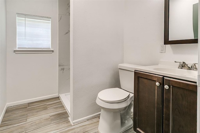 6609 SE 15th St, Oklahoma City, OK 73110 - full bath featuring vanity, a shower, and wood finished floors