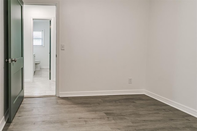 6609 SE 15th St, Oklahoma City, OK 73110 - unfurnished room with baseboards and wood finished floors