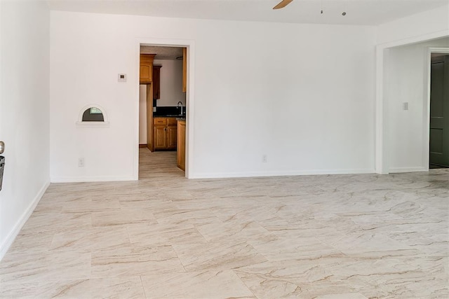 6609 SE 15th St, Oklahoma City, OK 73110 - unfurnished room with light marble finish flooring and a ceiling fan