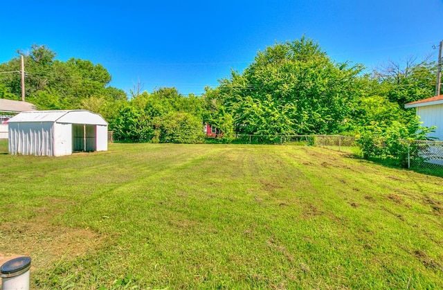 6609 SE 15th St, Oklahoma City, OK 73110 - view of yard with a storage unit