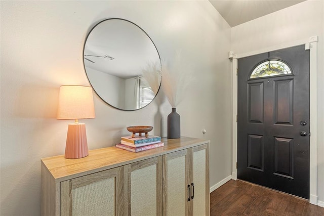 12281 SW 11th St, Yukon, OK 73099 - entryway featuring dark wood finished floors and baseboards