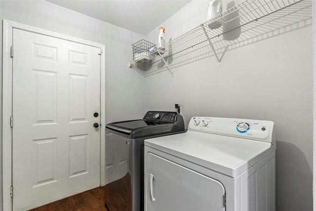 12281 SW 11th St, Yukon, OK 73099 - laundry room with independent washer and dryer and dark wood-type flooring