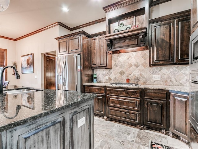 17401 Melville Ln, Edmond, OK 73012 - kitchen featuring appliances with stainless steel finishes, ornamental molding, dark stone countertops, decorative backsplash, and dark brown cabinetry