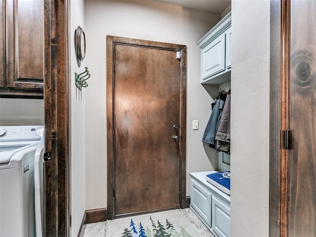 17401 Melville Ln, Edmond, OK 73012 - laundry room featuring washer / dryer and cabinet space