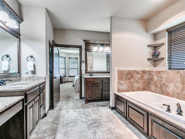 17401 Melville Ln, Edmond, OK 73012 - ensuite bathroom featuring a tub with jets and two vanities
