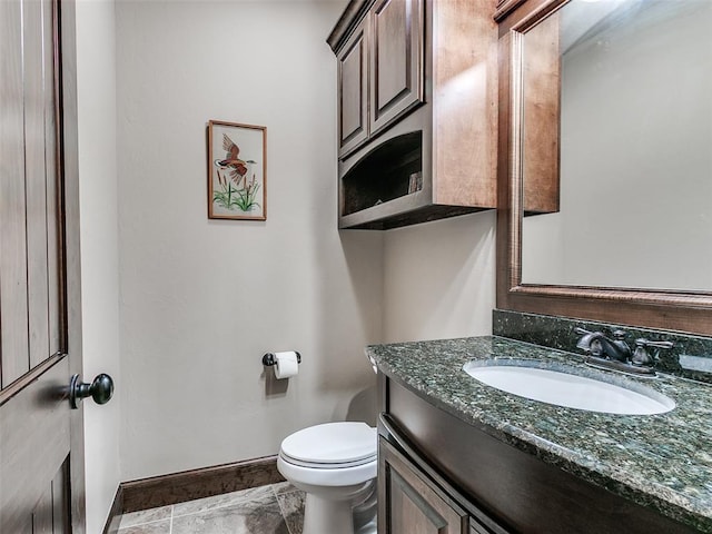 17401 Melville Ln, Edmond, OK 73012 - bathroom featuring vanity and baseboards