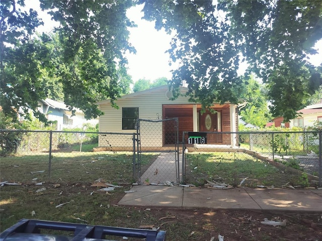 116 SE 39th St, Oklahoma City, OK 73129 - rear view of house with a gate