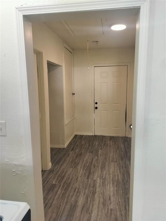 116 SE 39th St, Oklahoma City, OK 73129 - hallway featuring dark wood-style floors