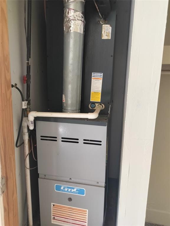 116 SE 39th St, Oklahoma City, OK 73129 - utility room featuring heating unit
