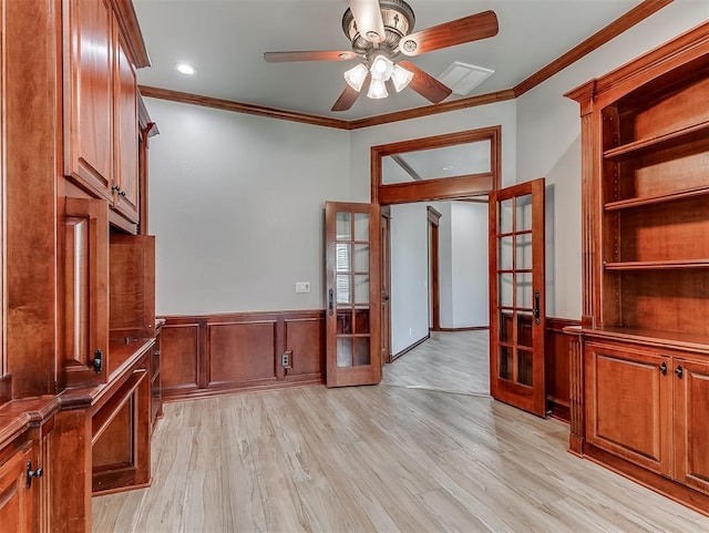 1217 Camelot Dr, Yukon, OK 73099 - unfurnished office with french doors, a ceiling fan, ornamental molding, a wainscoted wall, and light wood-type flooring