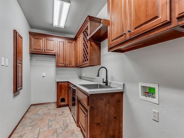 1217 Camelot Dr, Yukon, OK 73099 - laundry room with cabinet space, stone finish flooring, and hookup for a washing machine