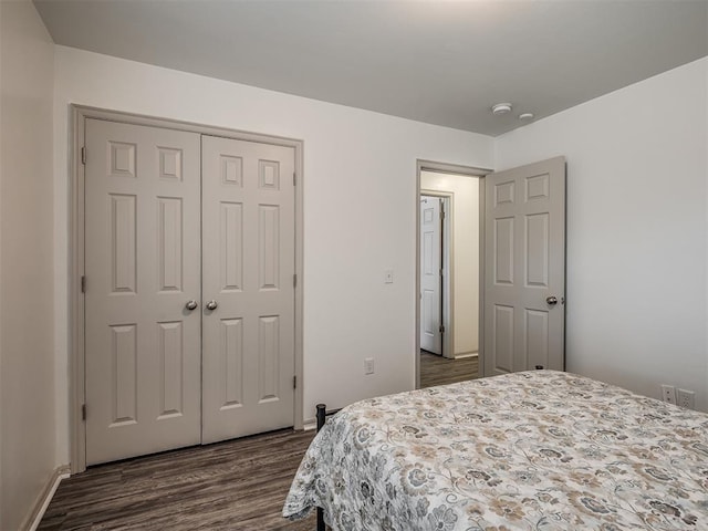 623 SW 37th St, Moore, OK 73160 - bedroom featuring dark wood-type flooring and a closet