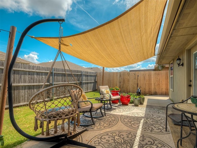 623 SW 37th St, Moore, OK 73160 - fenced backyard featuring a patio area