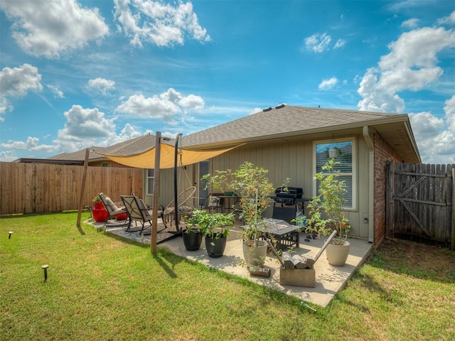 623 SW 37th St, Moore, OK 73160 - back of property featuring roof with shingles, a patio, and a fenced backyard
