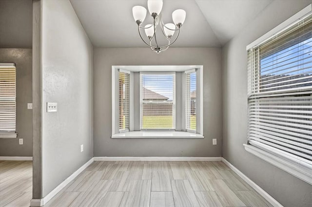 1109 Chestnut Creek Dr, Yukon, OK 73099 - empty room with a chandelier and vaulted ceiling