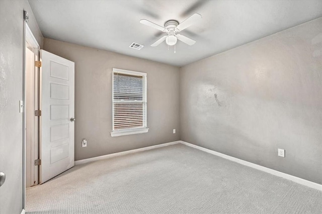 1109 Chestnut Creek Dr, Yukon, OK 73099 - carpeted spare room featuring a ceiling fan and baseboards