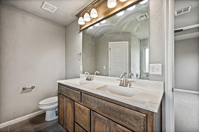 1109 Chestnut Creek Dr, Yukon, OK 73099 - full bath with double vanity and tile patterned floors