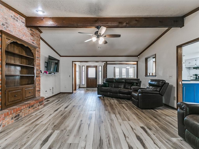 6105 W Gun Hill Way, Warr Acres, OK 73132 - living area with ceiling fan, ornamental molding, light wood finished floors, and a textured ceiling