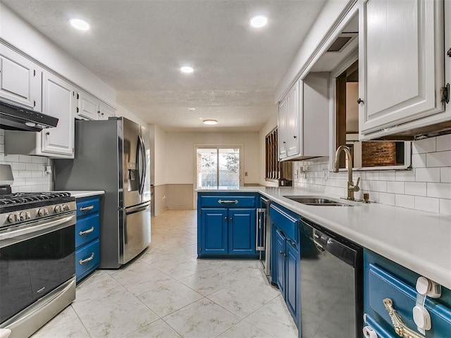 6105 W Gun Hill Way, Warr Acres, OK 73132 - kitchen featuring blue cabinets, appliances with stainless steel finishes, white cabinets, light countertops, and recessed lighting
