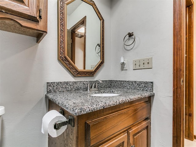6105 W Gun Hill Way, Warr Acres, OK 73132 - bathroom featuring vanity and toilet