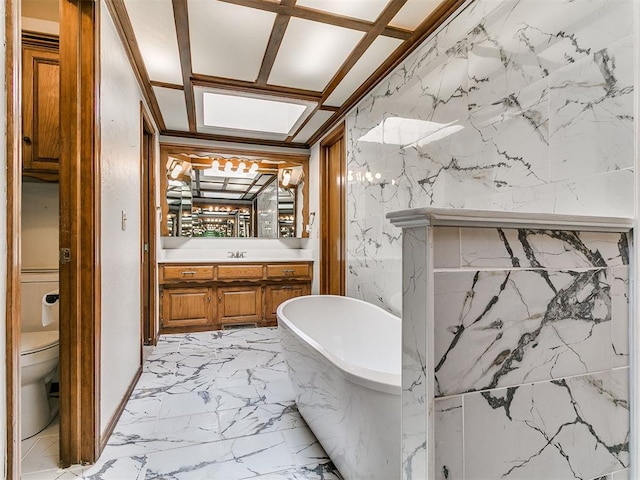 6105 W Gun Hill Way, Warr Acres, OK 73132 - bathroom with a freestanding tub, vanity, and marble finish flooring