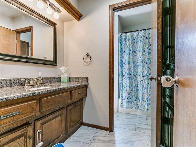 6105 W Gun Hill Way, Warr Acres, OK 73132 - full bath with marble look tiles, vanity, and shower / bath combo
