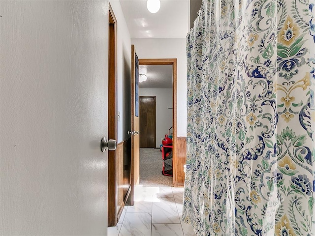 6105 W Gun Hill Way, Warr Acres, OK 73132 - corridor with light marble finish floors