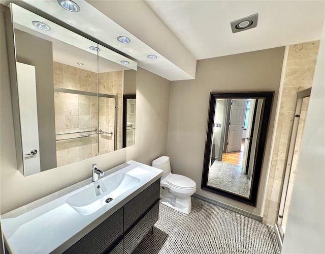 4400 Hemingway Dr Unit 202, Oklahoma City, OK 73118 - bathroom featuring vanity, a shower stall, and tile patterned floors