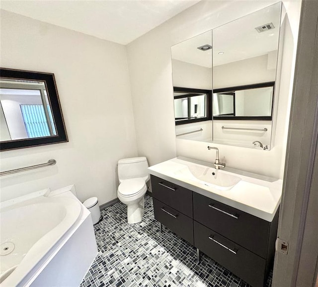 4400 Hemingway Dr Unit 202, Oklahoma City, OK 73118 - bathroom with toilet and vanity
