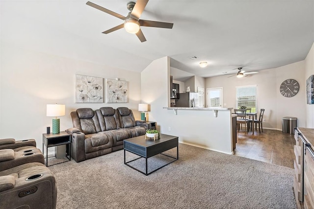 521 Audrey Dr, Tuttle, OK 73089 - carpeted living area featuring ceiling fan and baseboards