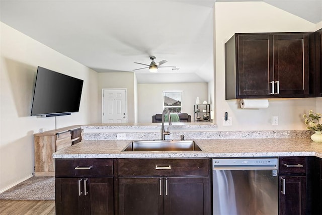 521 Audrey Dr, Tuttle, OK 73089 - kitchen featuring dishwasher, a ceiling fan, wood finished floors, light countertops, and dark brown cabinets