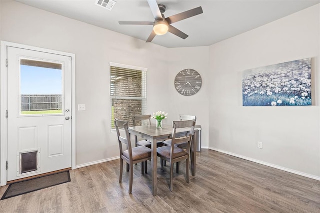 521 Audrey Dr, Tuttle, OK 73089 - dining room featuring wood finished floors and ceiling fan