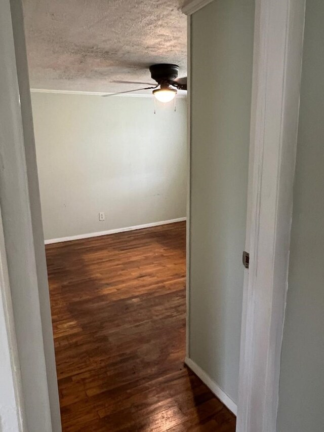 4123 S State Highway 605, Dothan, AL 36301 - spare room with a ceiling fan, wood finished floors, a textured ceiling, and baseboards