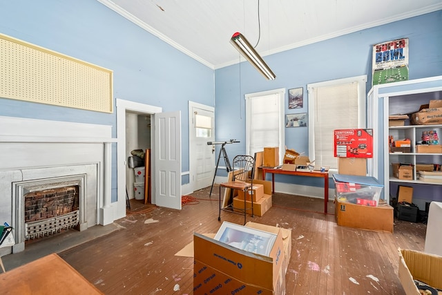 508 Newton Ave, Ozark, AL 36360 - interior space featuring ornamental molding, hardwood / wood-style flooring, a fireplace, and a towering ceiling