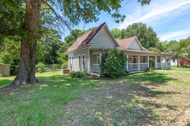 508 Newton Ave, Ozark, AL 36360 - view of front of property featuring a front yard, central AC, and a porch