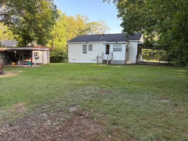 123 Hedstrom Dr, Dothan, AL 36301 - rear view of house featuring entry steps, a lawn, and crawl space