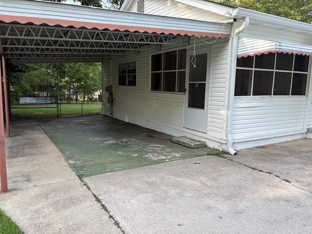 123 Hedstrom Dr, Dothan, AL 36301 - view of side of property with a carport and concrete driveway