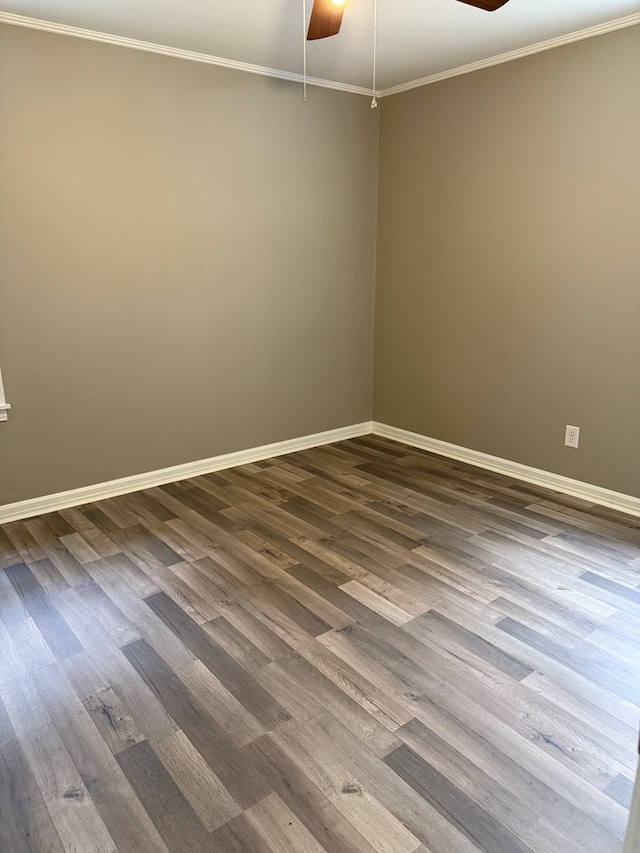 123 Hedstrom Dr, Dothan, AL 36301 - empty room with dark wood-style flooring, a ceiling fan, and ornamental molding