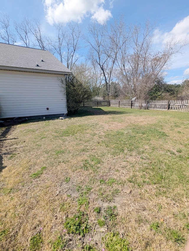 view of yard featuring fence