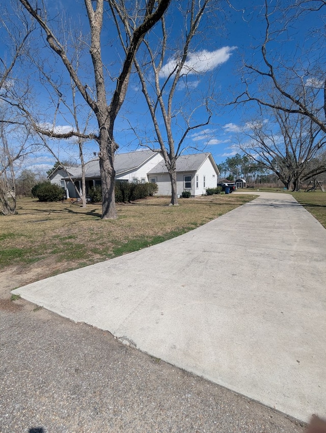 exterior space with concrete driveway