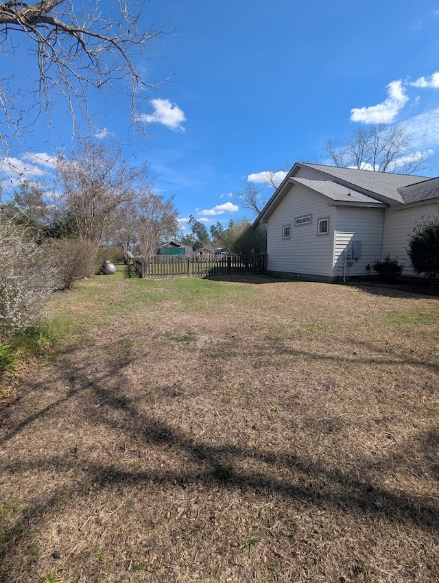 view of yard with fence