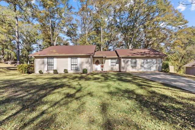 ranch-style home featuring a front yard