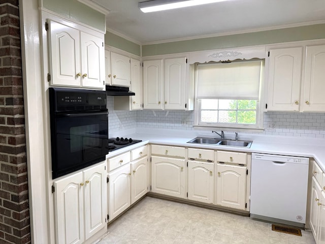 2403 Stonebridge Rd, Dothan, AL 36301 - kitchen with black appliances, a sink, decorative backsplash, light countertops, and crown molding