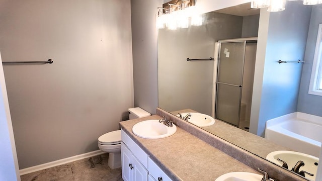 full bathroom featuring a stall shower, a bath, toilet, and a sink