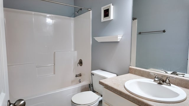 full bathroom featuring toilet, shower / bath combination, and vanity