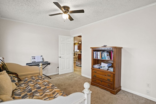 bedroom with baseboards, carpet, ornamental molding, and a textured ceiling