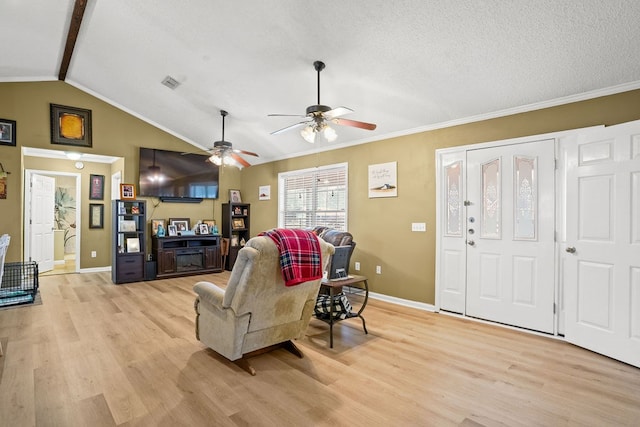 living room with light wood-type flooring, visible vents, vaulted ceiling with beams, and baseboards