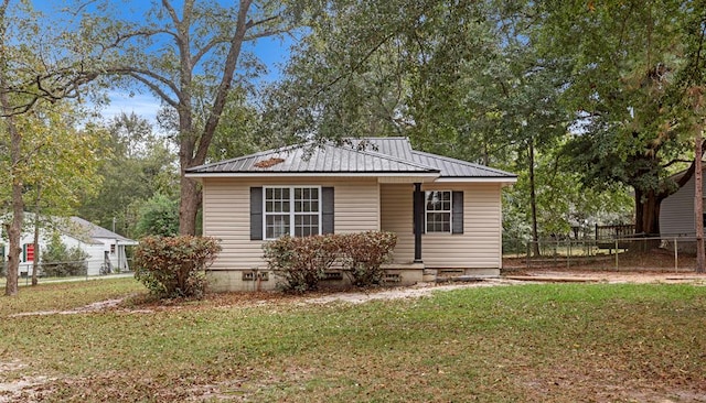 view of front of property with a front lawn