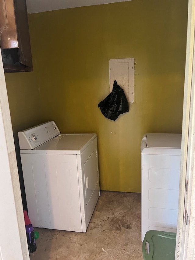 laundry area with independent washer and dryer